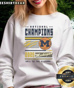 2026 NCAA Men's Basketball National Champions sweatshirt featuring Michigan Wolverines and 'Hail to the Victors' design.