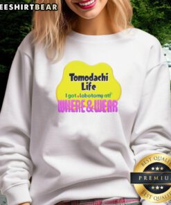 Person wearing a 'Nice Tomodachi Life I Got A Lobotomy At Where And Wear' sweatshirt, showcasing unique gaming style.