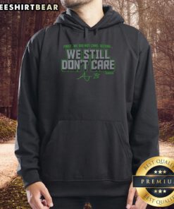 Official AJ Barner We Still Dont Care Hoodie in black, featuring bold graphic design and comfortable fit for casual wear.
