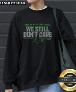 AJ Barner 'We Still Don't Care' sweatshirt featuring bold text design, perfect for casual and trendy outfits.