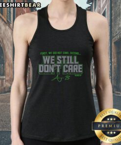 Official AJ Barner We Still Don't Care tank top featuring bold graphic design, perfect for casual summer outfits.