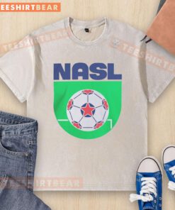 Alt Text: Official North American Soccer League logo on a washed t-shirt, showcasing team spirit and casual style.