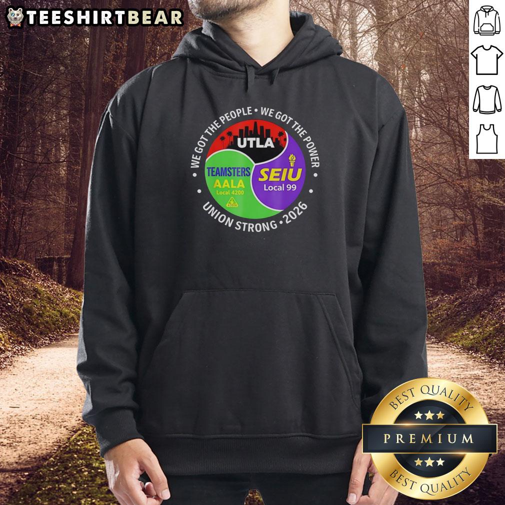 Original Labor Movement hoodie featuring Utla SEIU Aala design against a city skyline backdrop, promoting workers' rights.
