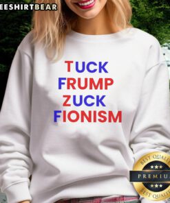Premium Fck Trump sweatshirt featuring a bold design with 'Tuck Frump Zuck Fionism' for political statement wear.