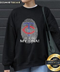 Premium Minnesota Twins baseball sweatshirt featuring 'It's In My DNA' design, perfect for fans and cozy wear.