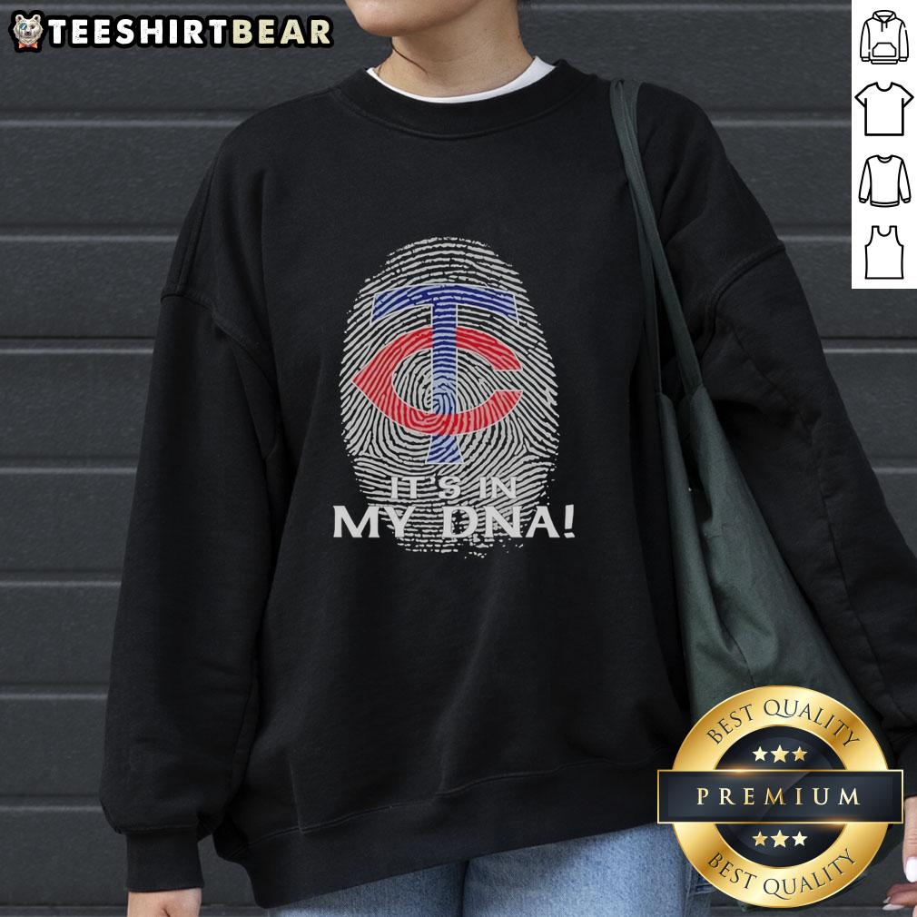 Premium Minnesota Twins baseball sweatshirt featuring 'It's In My DNA' design, perfect for fans and cozy wear.