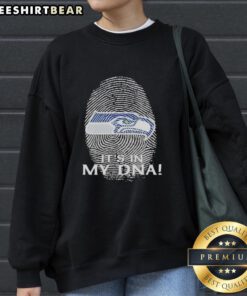 Premium Seattle Seahawks NFL sweatshirt featuring 'It's In My DNA' fingerprint design, perfect for fans and cozy wear.