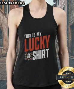 Girl wearing a pretty Anaheim Ducks tank top, showcasing her lucky team spirit at a hockey game.