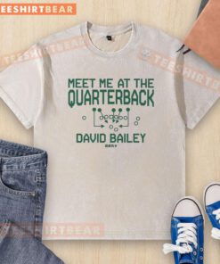 Alt Text: Pretty David Bailey Meet Me At The Quarterback washed t-shirt featuring a stylish design and comfortable fit.