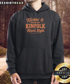 Alt Text: Stylish Nava style hoodie reading Pretty Kickin' It With My Kinfolk on a model in a cozy outdoor setting.