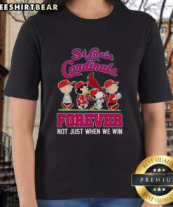 Alt Text: Pretty Peanuts characters with St. Louis Cardinals MLB logo on a ladies tee, celebrating fandom beyond wins.
