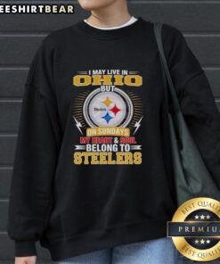 Cozy sweatshirt featuring 'I May Live In Ohio But On Sundays My Heart And Soul Belong To Steelers' design.