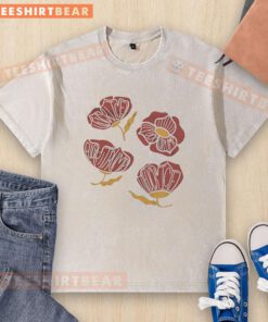 Pretty red poppy floral graphic on a washed t-shirt, perfect for casual style and nature lovers.