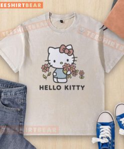 Alt Text: Pretty Snl Jane Wickline wearing a Sanrio Old Navy Hello Kitty garment dyed washed t-shirt, showcasing vibrant colors.