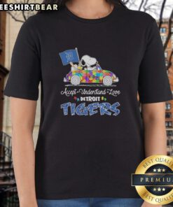 Alt Text: Pretty Snoopy and Woodstock driving a car on a Detroit Tigers ladies tee promoting autism acceptance and love.