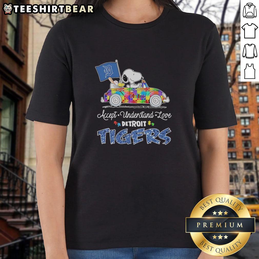 Alt Text: Pretty Snoopy and Woodstock driving a car on a Detroit Tigers ladies tee promoting autism acceptance and love.