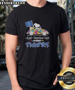 Alt Text: Pretty Snoopy and Woodstock driving a car on a Detroit Tigers T-shirt promoting autism acceptance and love.