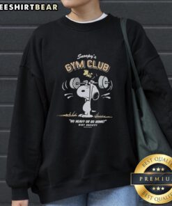 Pretty Snoopy's Gym Club 'Go Heavy or Go Home' sweatshirt by Riot Society, featuring a stylish design perfect for workouts.