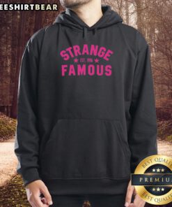 Pretty Strange Famous Est 1996 Hoodie displayed on a mannequin, showcasing its unique design and vibrant colors.