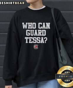 Tessa wearing a Pretty Who Can Guard South Carolina Gamecocks sweatshirt, showcasing team spirit in vibrant colors.