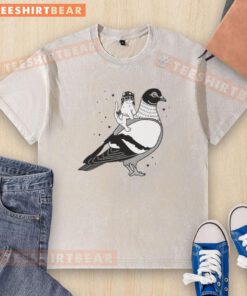 Top Gary riding pigeon cat in a hat flies on dove, featured on a washed T-shirt design.
