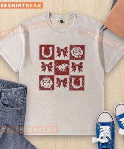 Top Greatest Race Horse Racing graphic on a washed t-shirt featuring horseshoe and bow rose icons.