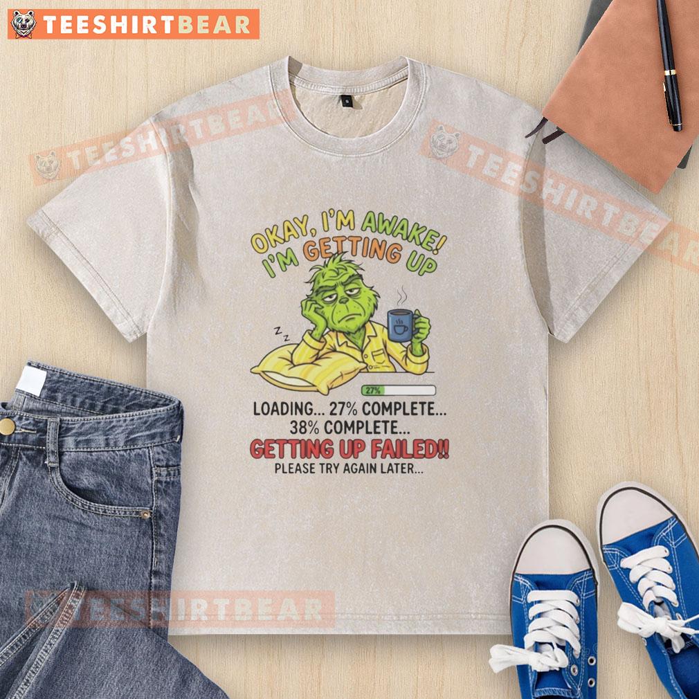Top Grinch t-shirt design featuring 'Okay I'm Awake, I'm Getting Up' text, perfect for Christmas spirit and holiday fun.