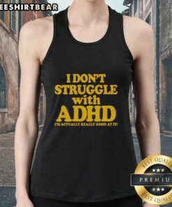 Person wearing a 'I Don't Struggle With ADHD, I'm Actually Really Good At It' tank top, promoting ADHD awareness and positivity.