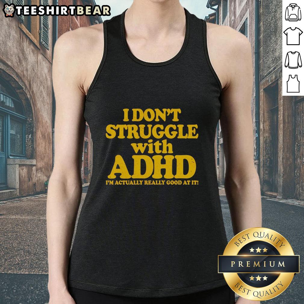 Person wearing a 'I Don't Struggle With ADHD, I'm Actually Really Good At It' tank top, promoting ADHD awareness and positivity.