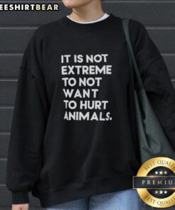 Cozy sweatshirt with 'It's Not Extreme To Not Want To Hurt Animals' slogan, promoting animal welfare and compassion.