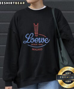 Alt Text: Loewe Desde 1846 Madrid sweatshirt displayed on a hanger, showcasing its stylish design and premium fabric.
