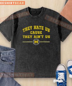 Top Michigan Wolverines Basketball 'They Hate Us Cause They Ain't Us' washed t-shirt in navy blue, perfect for fans.