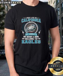 Alt Text: Top Philadelphia Eagles t-shirt with 'I May Live In California But On Sundays My Heart And Soul Belong To Eagles' design.