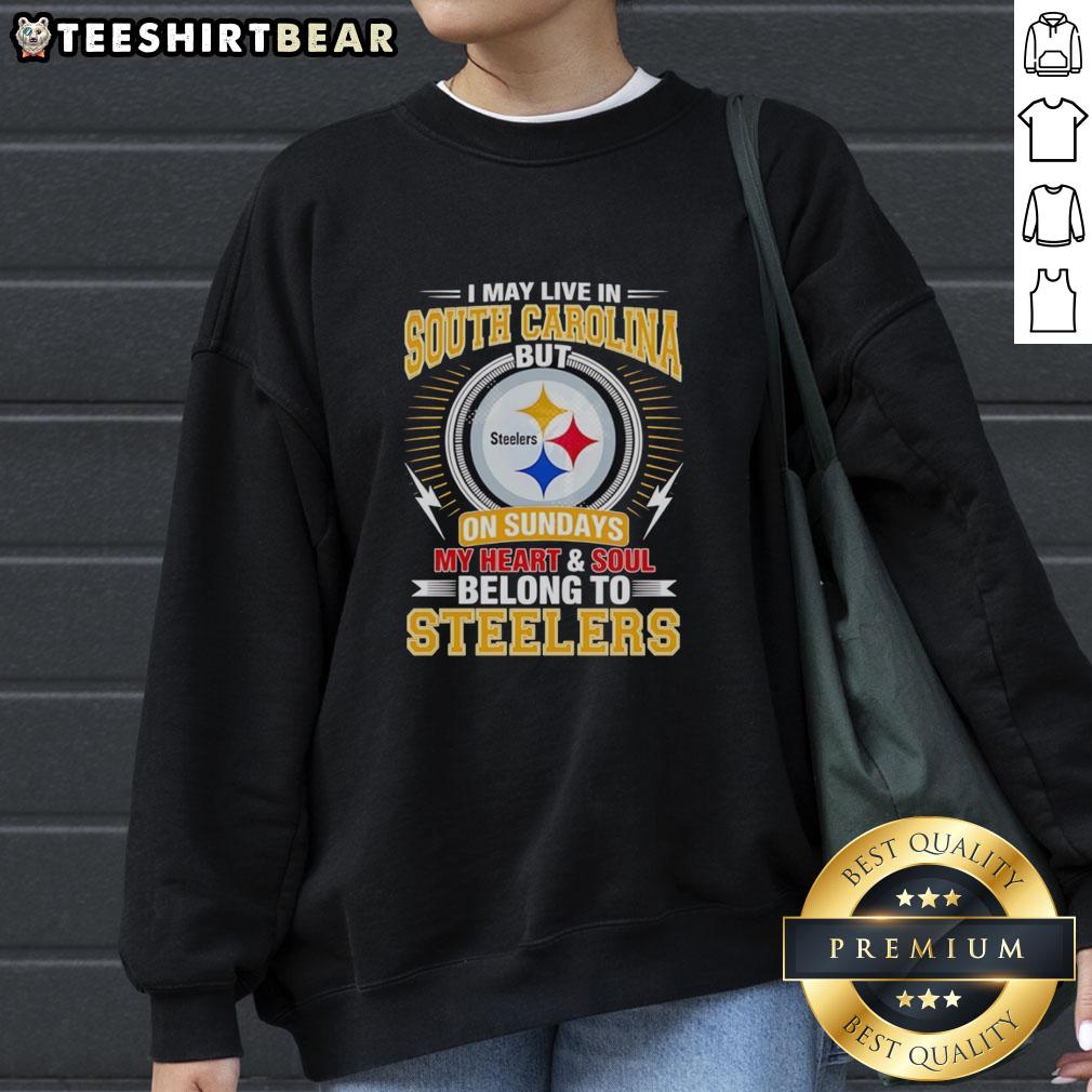 Cozy sweatshirt featuring 'I Live In South Carolina But My Heart Belongs To Steelers' for Pittsburgh Steelers fans.