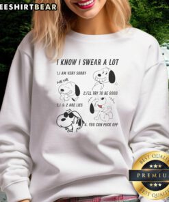 Cozy sweatshirt featuring Snoopy with 'I swear a lot, I am very sorry' text, perfect for casual wear and dog lovers.