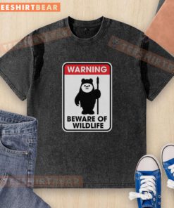 Top Warning Beware of Wildlife washed T-shirt featuring bold graphics and eco-friendly fabric for nature lovers.
