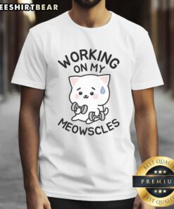 Person wearing a 'Top Working On My Meowscles' T-Shirt, showcasing a fun and vibrant design perfect for fitness enthusiasts.