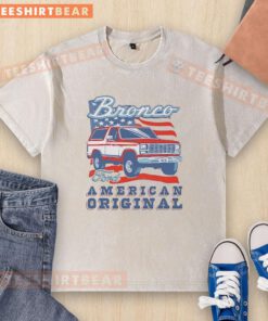 Awesome Ford Bronco American Original T-Shirt with vintage wash, featuring classic car and American flag design.