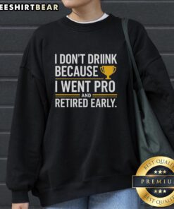 Yellow sweatshirt with 'I Don't Drink Because I Went Pro and Retired Early' slogan, perfect for sports enthusiasts.