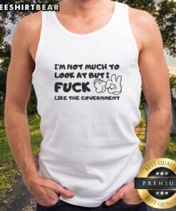 Cartoon tank top featuring 'I'm Not Much to Look At but I Fck Like the Government' design, showcasing humor and style.