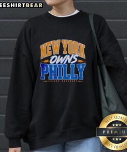 Alt Text: Awesome New York Knicks Owns Philly Rivalry Statement Basketball Sweatshirt featuring team colors and logo.