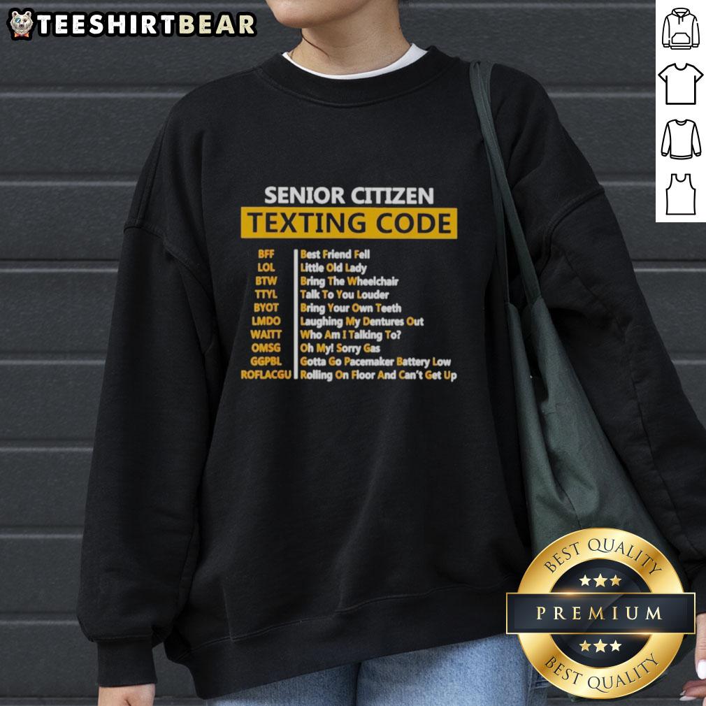 Awesome senior citizens wearing a texting code sweatshirt, showcasing humor and style for active older adults.