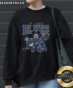 Awesome St. Louis Blues Disney team ice hockey sweatshirt featuring vibrant graphics and a cozy design for fans.