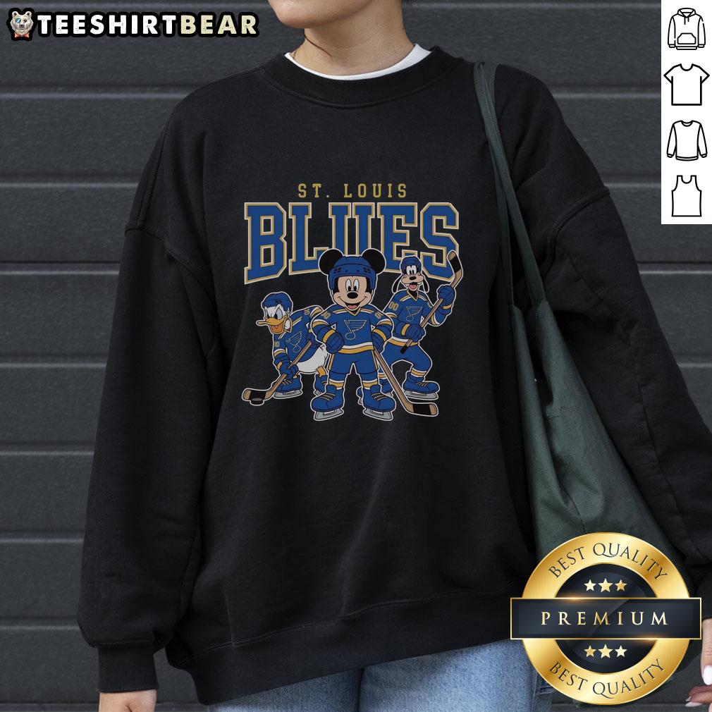Awesome St. Louis Blues Disney team ice hockey sweatshirt featuring vibrant graphics and a cozy design for fans.