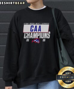 2026 CAA Men's Lacrosse Champions sweatshirt featuring the Stony Brook Seawolves logo and vibrant team colors.