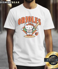 Alt Text: Cute Baltimore Orioles Hello Kitty T-Shirt featuring a playful design with Hello Kitty and Orioles logo, perfect for fans.