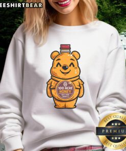 Cute bear design on a honey bottle sweatshirt, perfect for cozy casual wear and animal lovers.