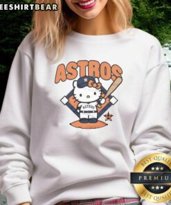 Alt Text: Cute Houston Astros Hello Kitty sweatshirt featuring a playful design, perfect for fans and cozy wear.