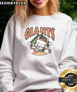 Cute orange San Francisco Giants Hello Kitty sweatshirt featuring a playful design, perfect for fans and fashion lovers.