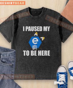 Alt Text: Good I Paused My E621 To Be Here logo on a washed t-shirt, perfect for fans of furry art and memes.